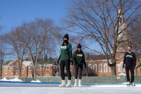 Students ice skating on the green