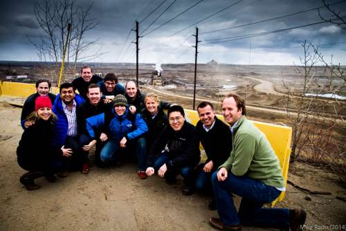 Oil_Sands_Tuck_group_with_the_Syncrude_North_Mine_in_the_background.jpg