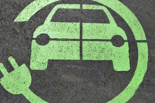 Electric car paint symbol on concrete