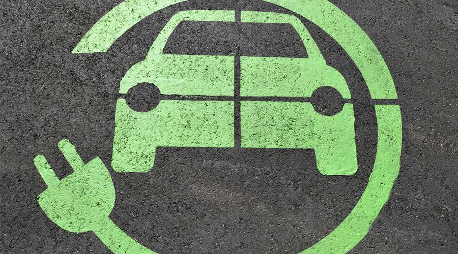 Electric car paint symbol on concrete