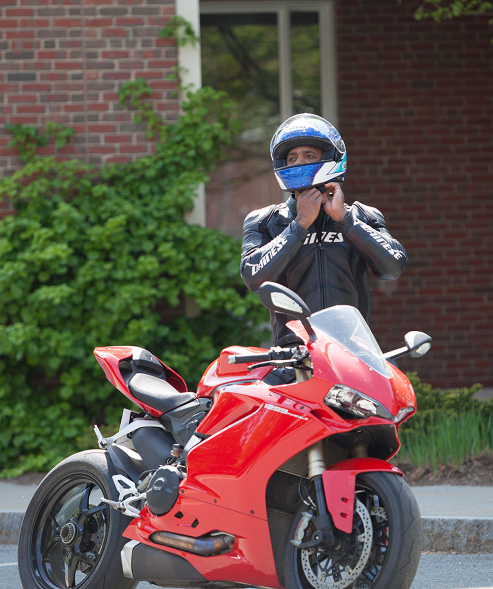 Josh Henry T'18 with motorcycle